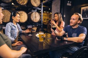 a group of friends enjoying beers together