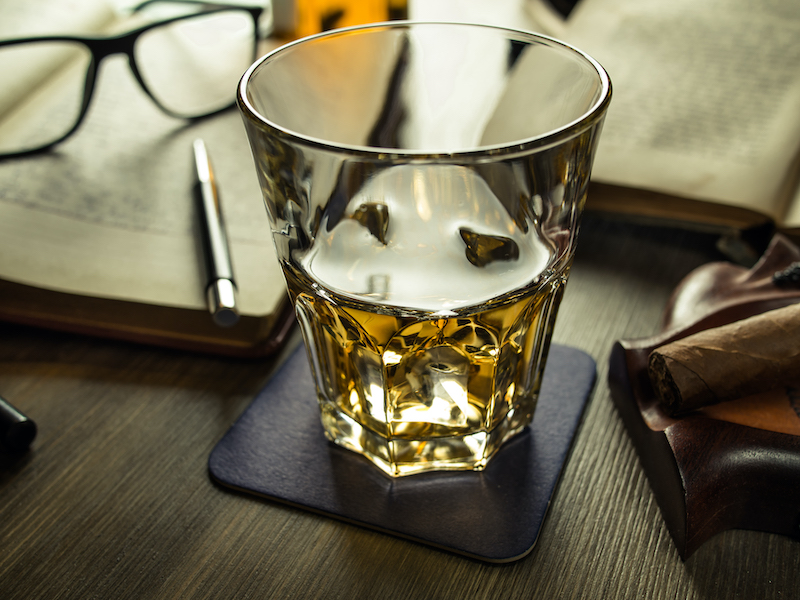 Carbon balanced, whiskey glass on a beer mat.